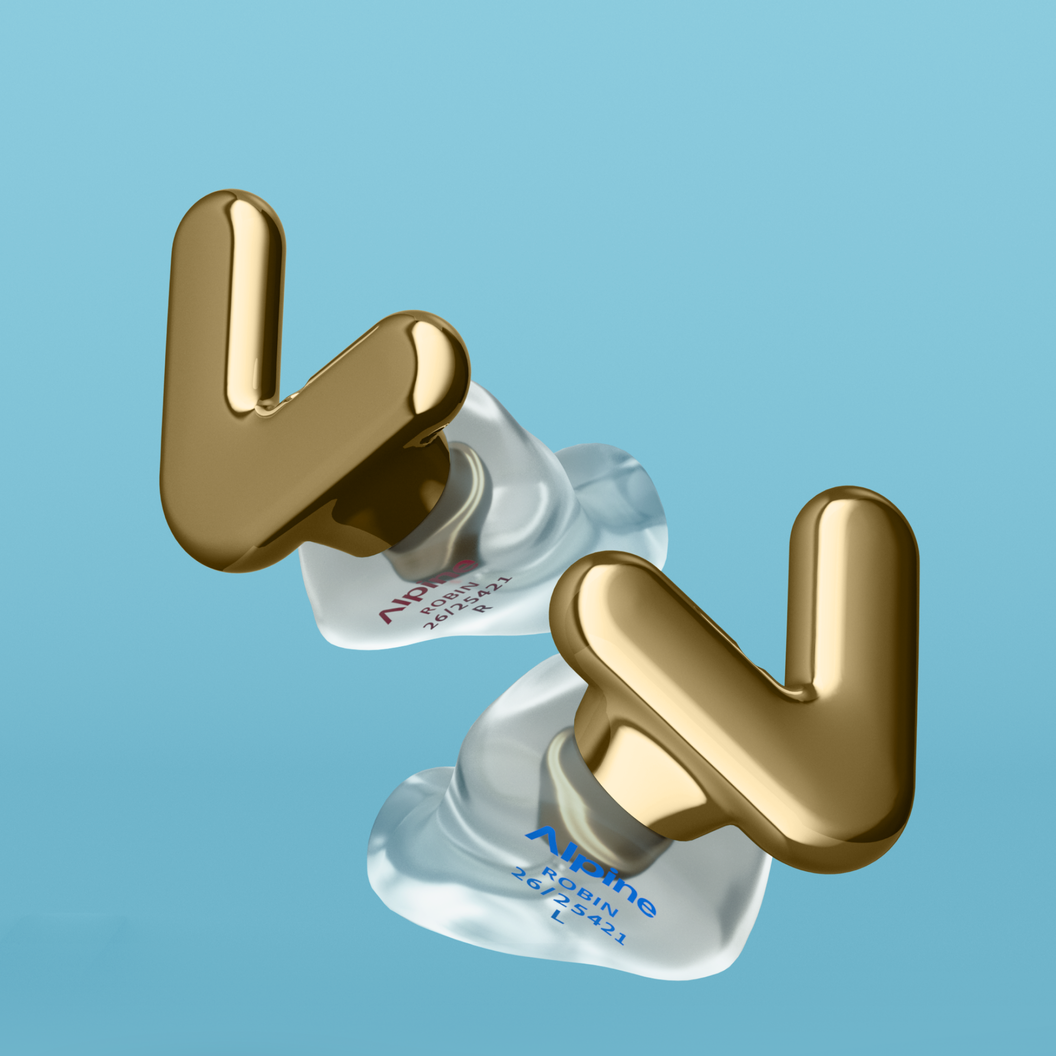 Pair of Alpine Tune Custom Gold earplugs on transparent ear pieces, floating against a light blue background