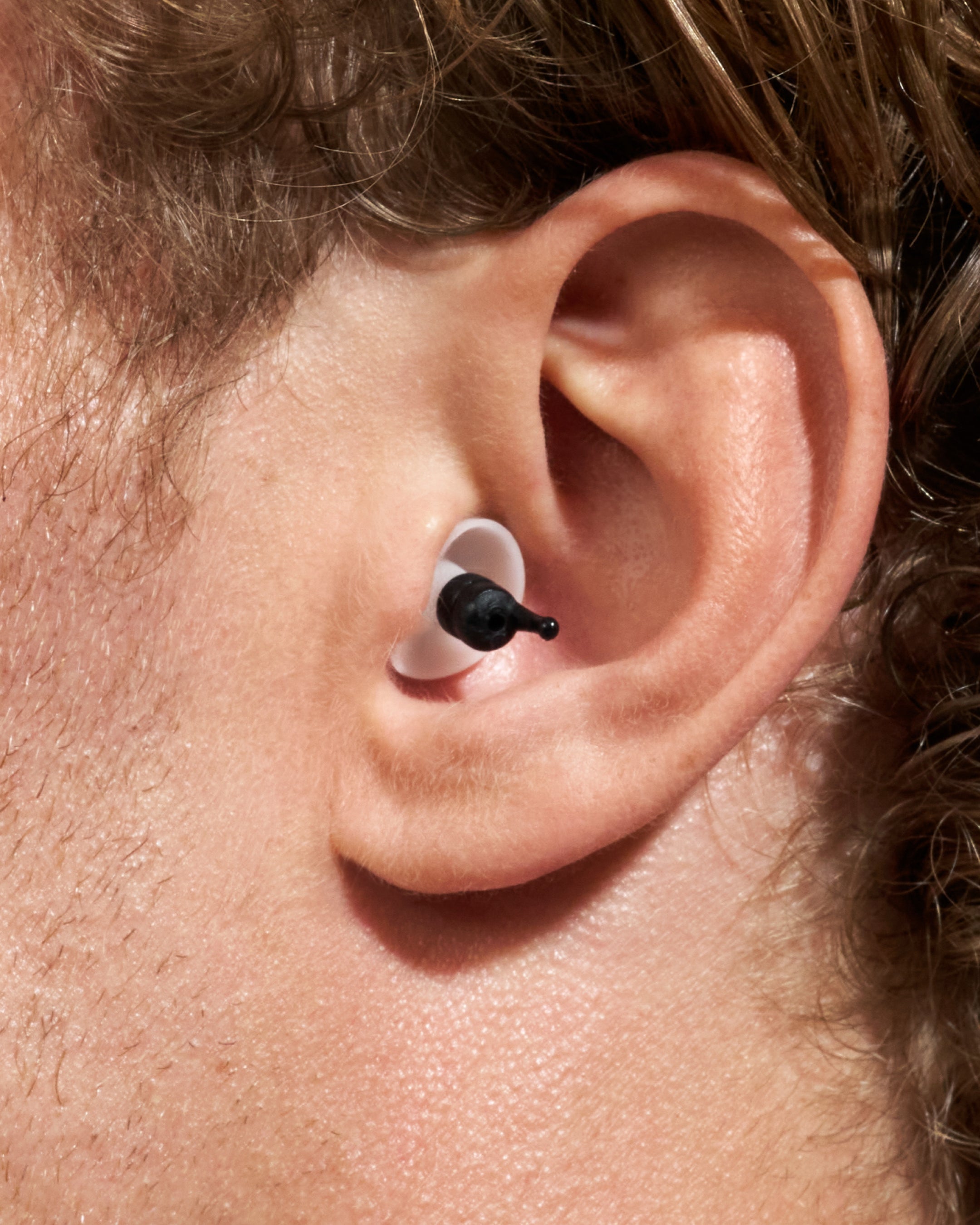 Close-up of Alpine MotoSafe Tour in ear 