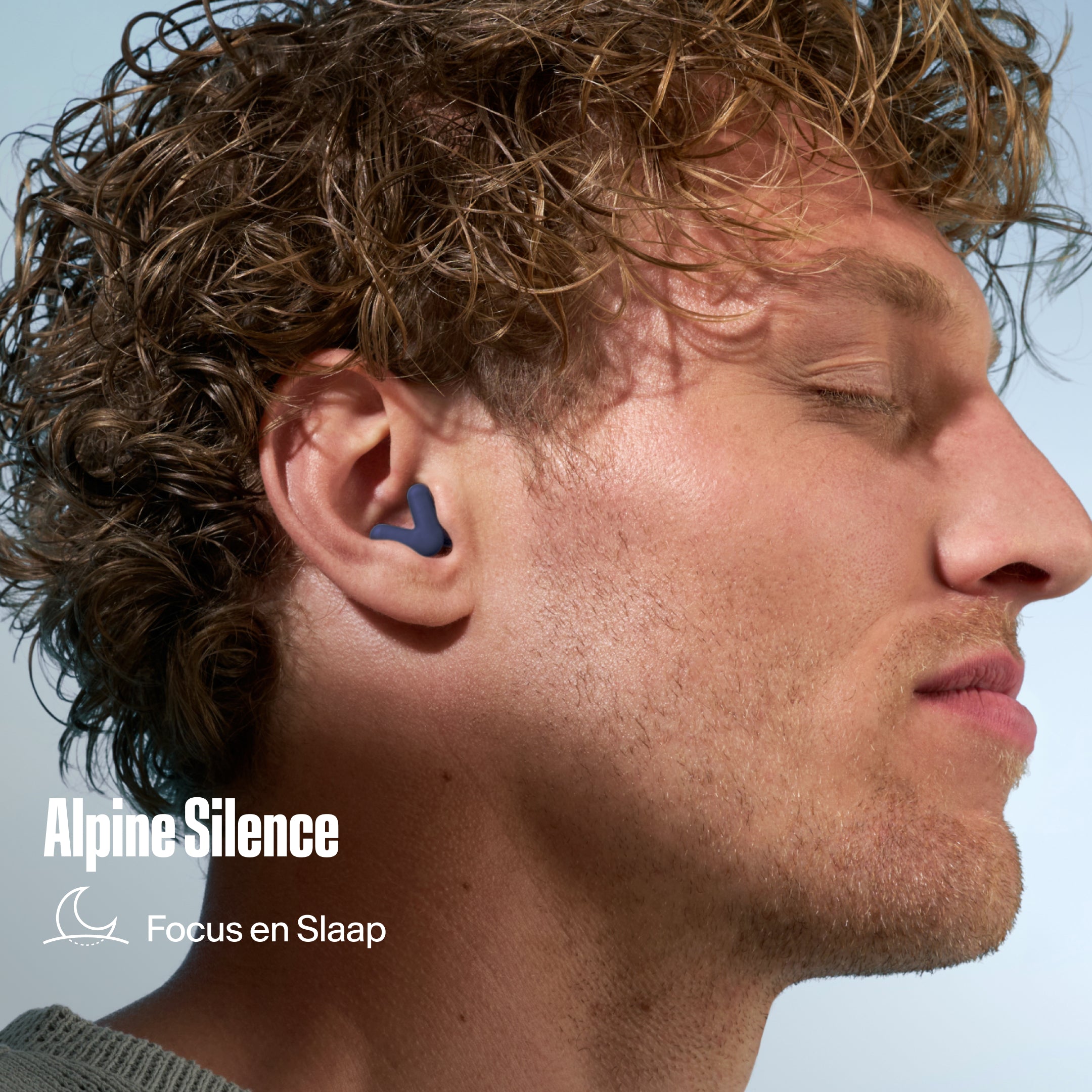 Person wearing Alpine Silence earplugs  