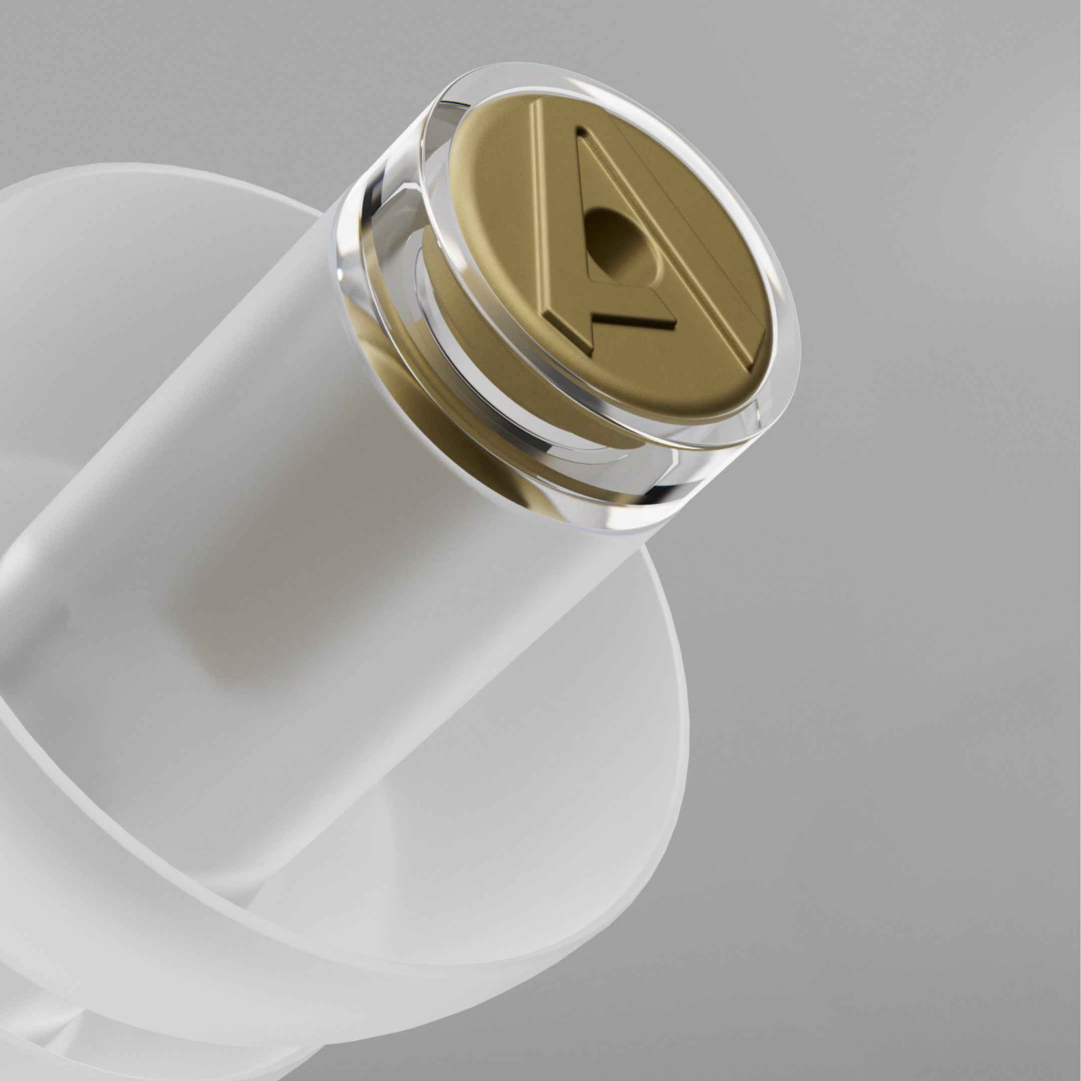 Close-up of the gold-tone filter with Alpine logo on an Alpine MusicSafe earplug 