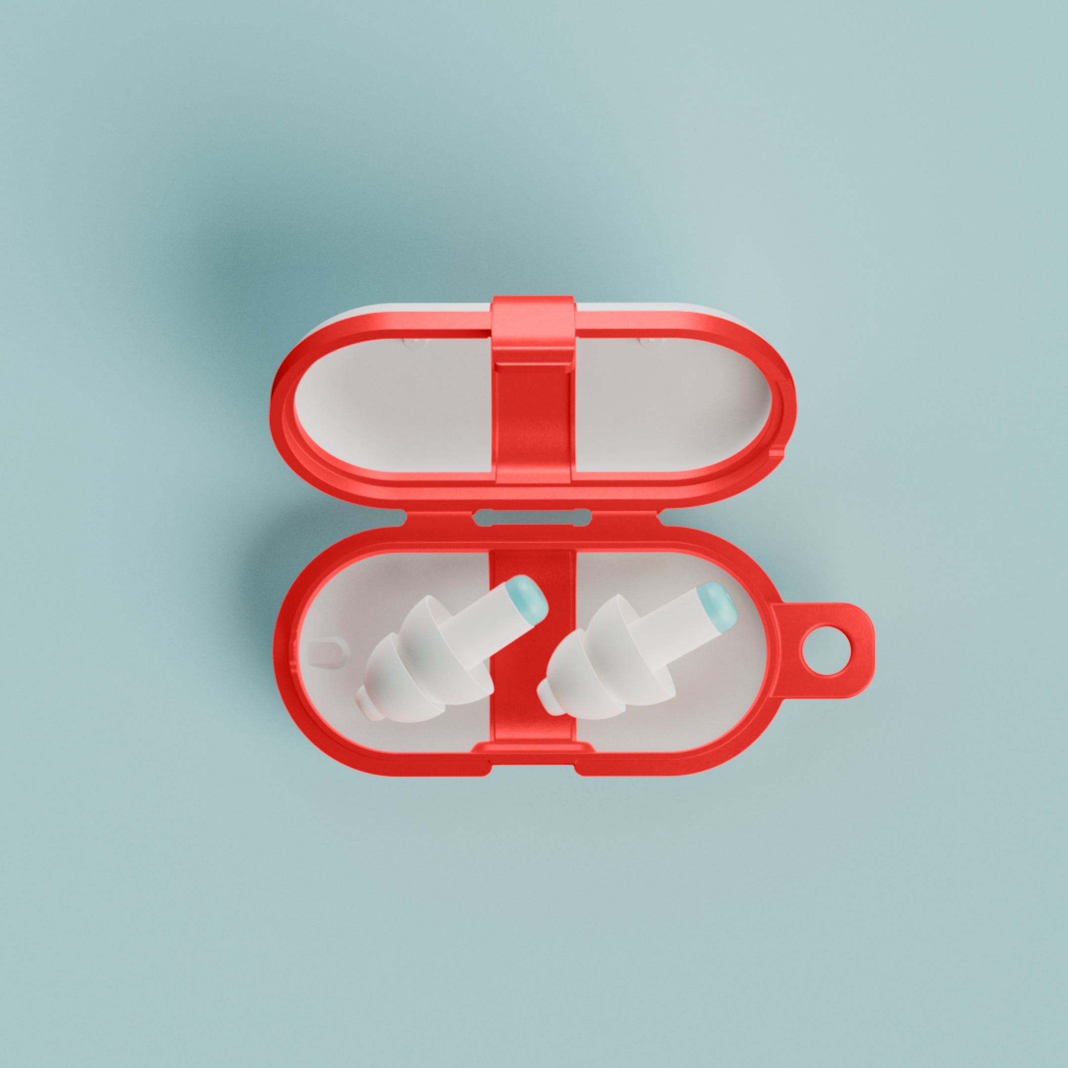 Pair of Alpine Pluggies Kids earplugs in an open red travel case, top view